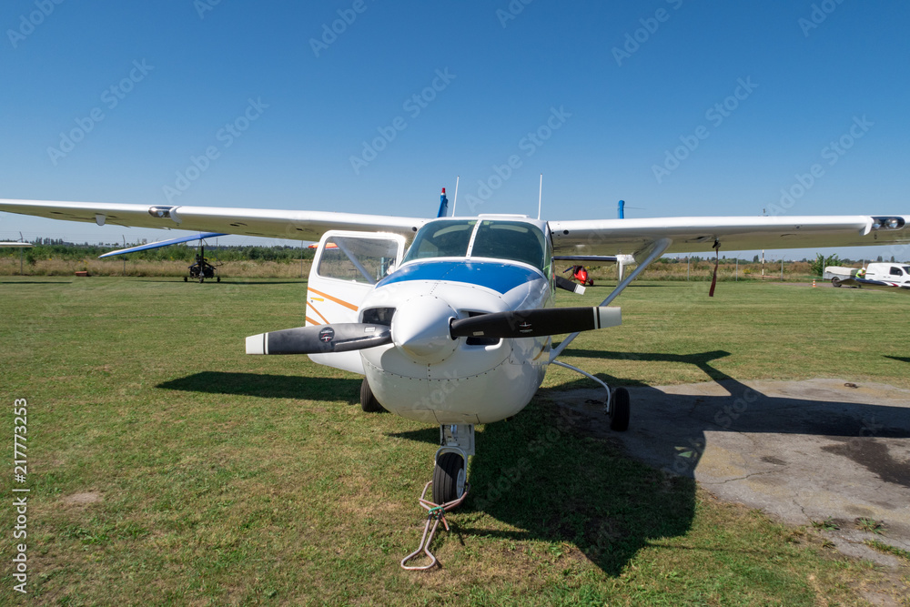 a variety of airplanes on the field a variety of airplanes on the field