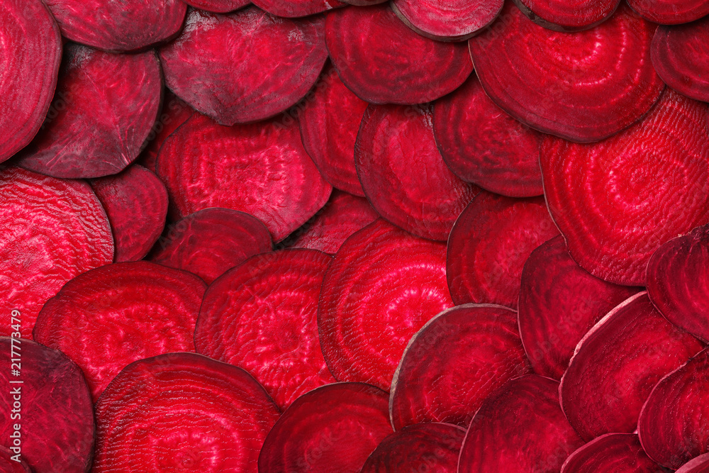 Cut beets as background. Backdrop for design - obrazy, fototapety, plakaty 