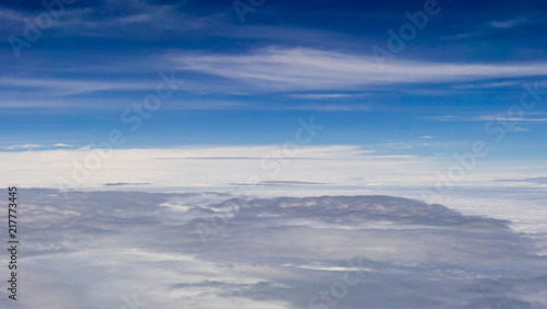 Cloud floating above clear blue sky background