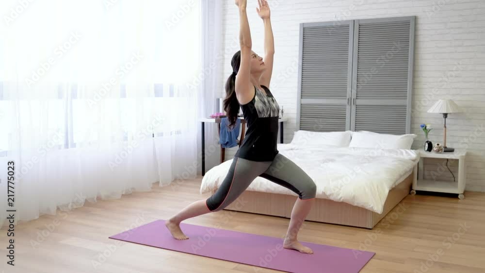 woman doing warm-up exercise and raise her hands woman doing warm-up exercise and raise her hands