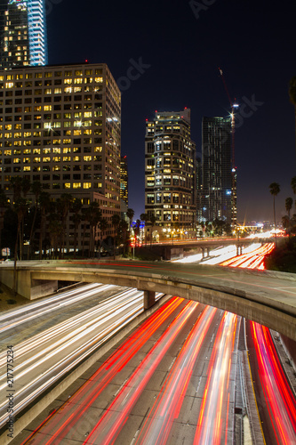 Amazing long exposure of Los Angeles Downtown traffic at night in California, USA. © SEvelyn