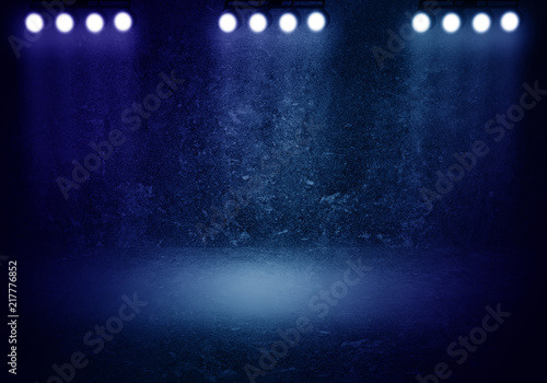 background of an empty scene with spotlights. Dark abstract background with smoke and lights