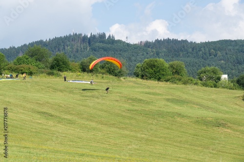 Paragliders on the meadow. Slovakia
