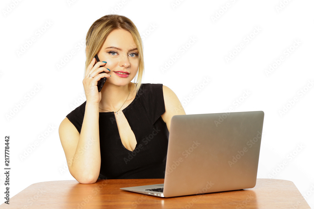 Girl businesswoman working behind laptop, computer and mobile phone isolated on white background Girl businesswoman working behind laptop, computer and mobile phone isolated on white background