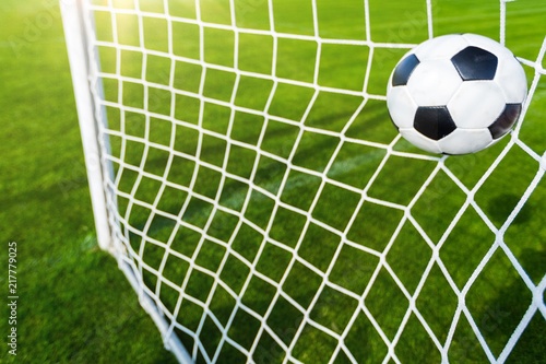 Soccer ball in goal  sport concept
