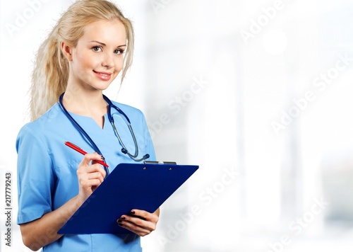 Doctor at hospital working with tablet
