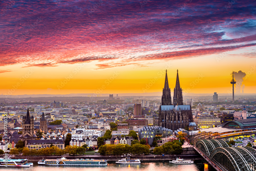 Cologne Cathedral at sunset, skyline of Cologne, Germany