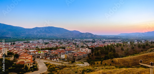Selcuk, Turkey. Panorama of the view of the city and the mountains at sunset.