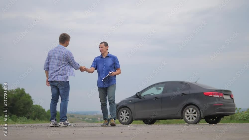man test drive car.two men make deal. man seller driver makes car the auto insurance slow motion video sale sells used cars. Buying rent a car . man lifestyle car insurance sale of used cars concept man test drive car.two men make deal. man seller driver makes car the auto insurance slow motion video sale sells used cars. Buying rent a car . man lifestyle car insurance sale of used cars concept