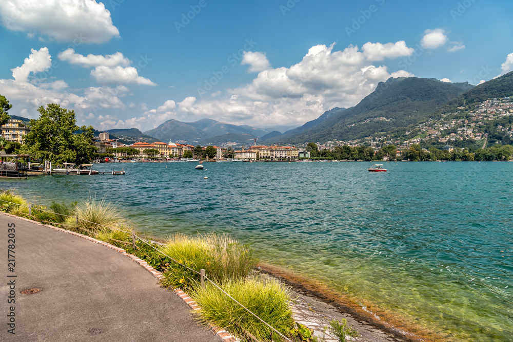 View of Lake Lugano in summer sunny day from Lugano city, Switzerland