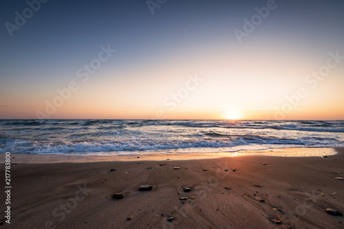 Fototapeta Naklejka Na Ścianę i Meble -  Sunrise at the beach.