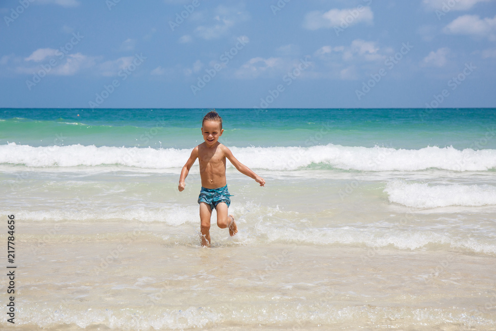 little boy in the sea in Thailand