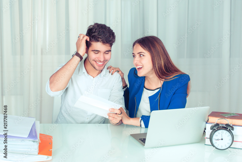 man Reading Letter happily woman supporting him, happy Together man Reading Letter happily woman supporting him, happy Together
