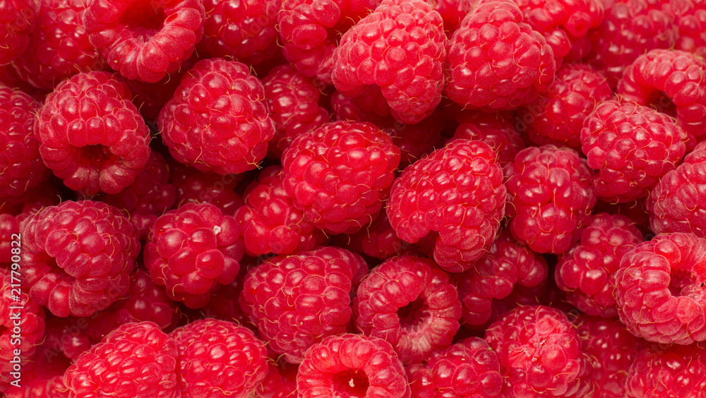 Background of ripe red raspberries Background of ripe red raspberries