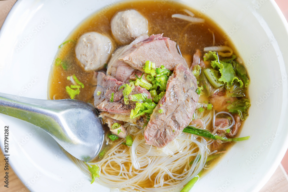 Beef noodles with braised beef and meatball delicious Chinese style Asian favorite Thai street food. Beef noodles with braised beef and meatball delicious Chinese style Asian favorite Thai street food.