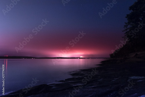 Purple hight sunset still water reflection and mountains in Canada