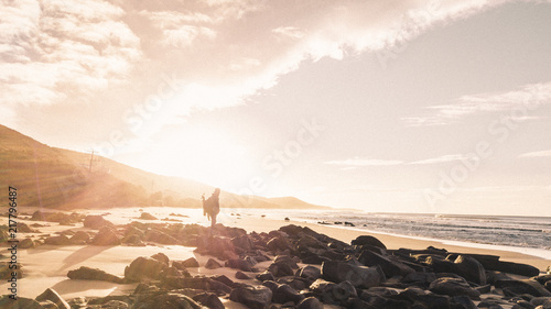 Aerial View of Waves and People and Beach Along Great Ocean Road, Victoria, Australia at Sunrise