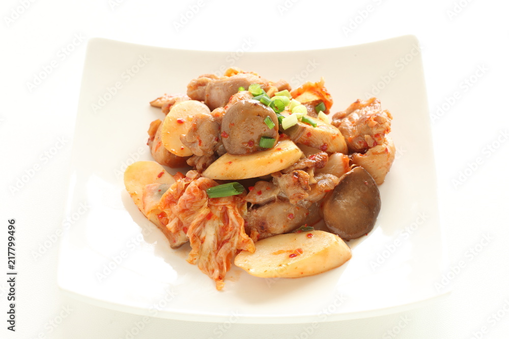 Korean kimchi and pork stri fried with Erigin mushroom Korean kimchi and pork stri fried with Erigin mushroom
