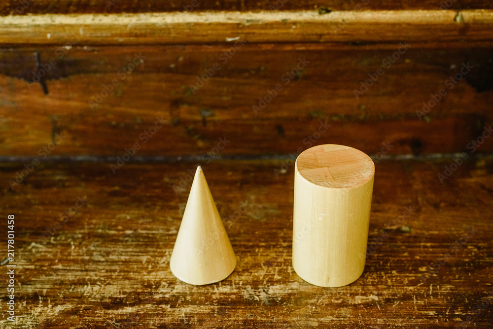 Solid wood shapes to study geometry and volumes, cones, triangles ...