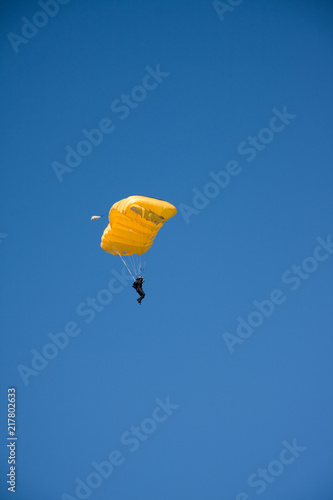 open parachute with blue sky