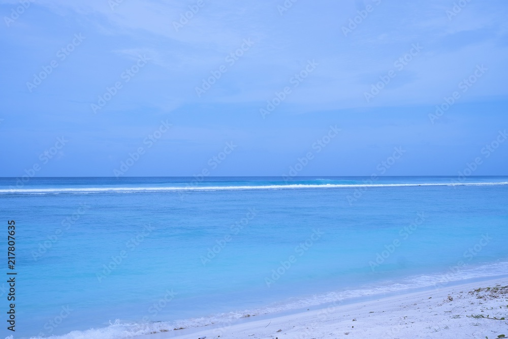 The blue sea under clear sky. The blue sea under clear sky.