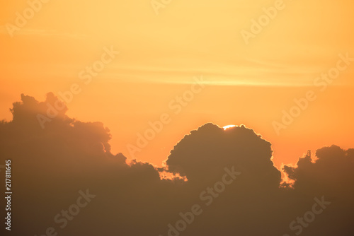 Wallpaper Mural Orange light, sun and big clouds Torontodigital.ca