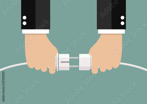 Man holding in hand plug and socket to connect