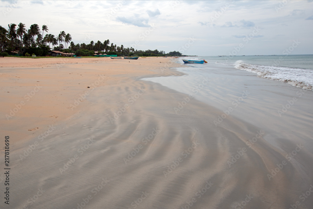 Swirling sand patterns on Nilaveli Beach in Trincomalee Sri Lanka Asia