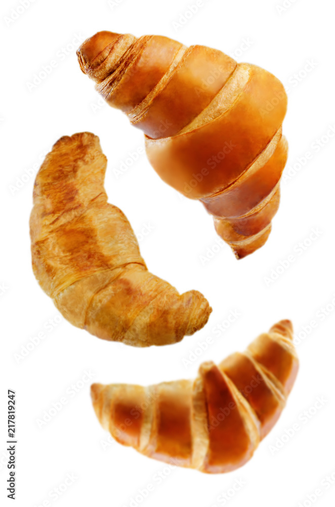Flying croissants isolated Flying croissants isolated