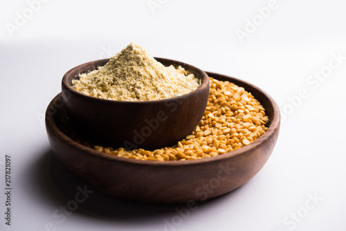 Besan, Gram or chickpea flour or powder is a pulse flour made from a variety of ground chickpea known as Bengal gram. popular ingredient for Pakora/pakoda or bajji snack. Selective focus