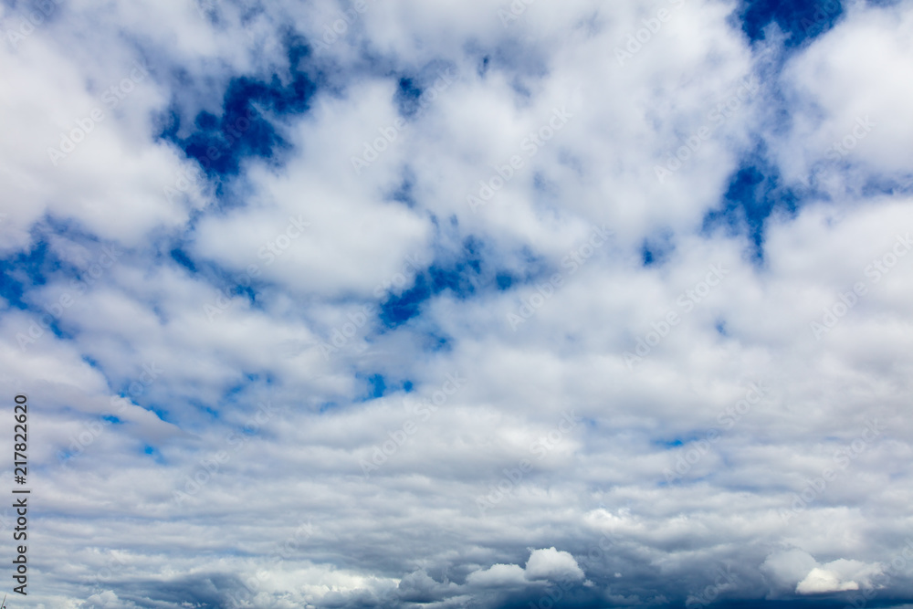 Clouds on a blue sky as a background Clouds on a blue sky as a background