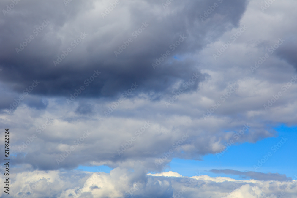 Clouds on a blue sky as a background