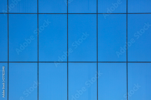 Blue windows in the house as an abstract background