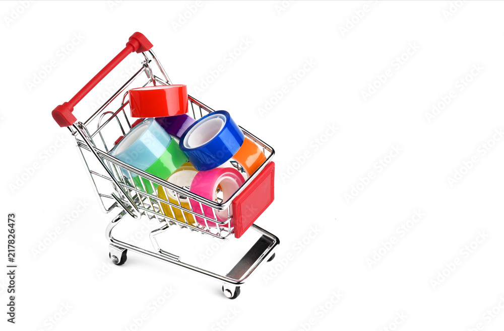 Colorful adhesive tapes in shopping cart