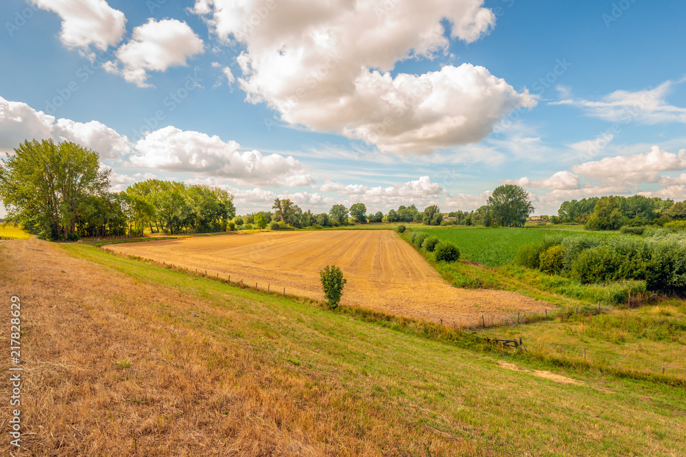 Colorful Dutch landscape with fascinatingly beautiful clouds