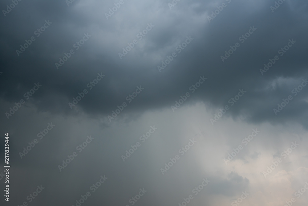 dark storm clouds with background,Dark clouds before a thunder-storm. dark storm clouds with background,Dark clouds before a thunder-storm.