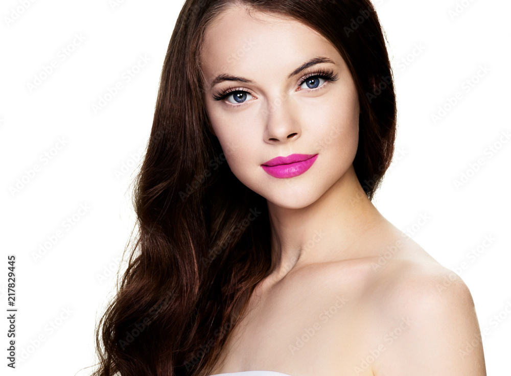 Beautiful brunette woman with beauty lashes and pink lipstick healthy skin isolated on white Beautiful brunette woman with beauty lashes and pink lipstick healthy skin isolated on white