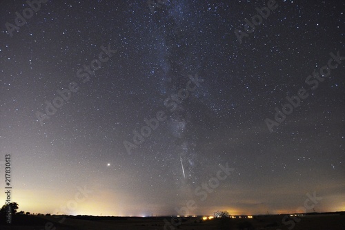 Milky way with Mars and a falling star Perseids