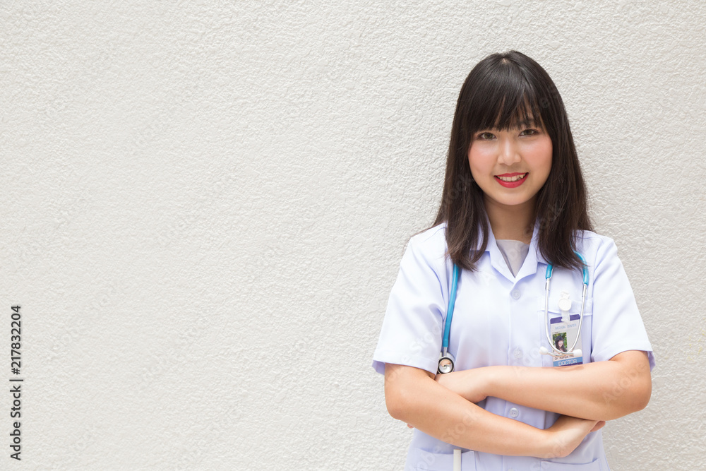 The woman Asian doctor White Shirt suit with stethoscope working outdoor Hospital. The woman Asian doctor White Shirt suit with stethoscope working outdoor Hospital.