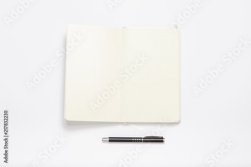 White notebook minimal image on white table