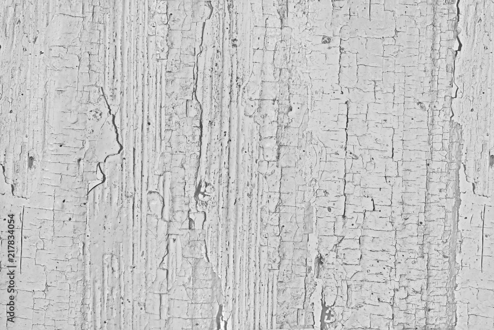 Obraz premium The texture of an old board with cracked paint