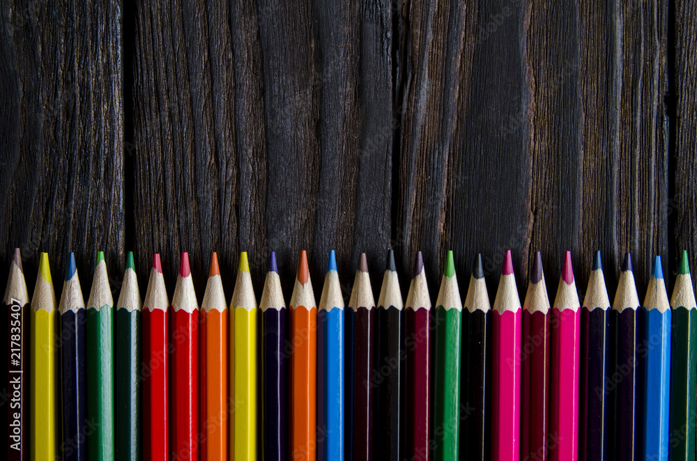 back to school, pencils of different colors on a wooden background, preparation for school back to school, pencils of different colors on a wooden background, preparation for school