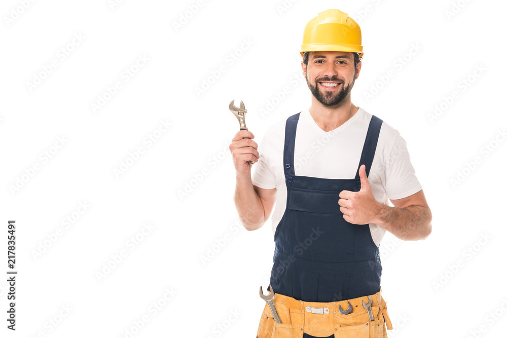 handsome happy workman holding wrench and showing thumb up isolated on white handsome happy workman holding wrench and showing thumb up isolated on white