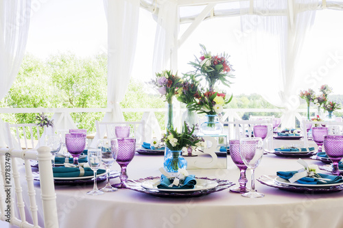 Wedding decoration. Wedding table decor in lavender and emerald