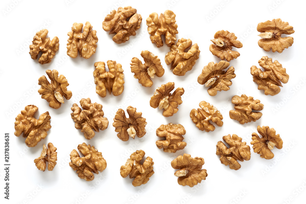 Walnut kernels isolated on white background. Top view. Walnut kernels isolated on white background. Top view.