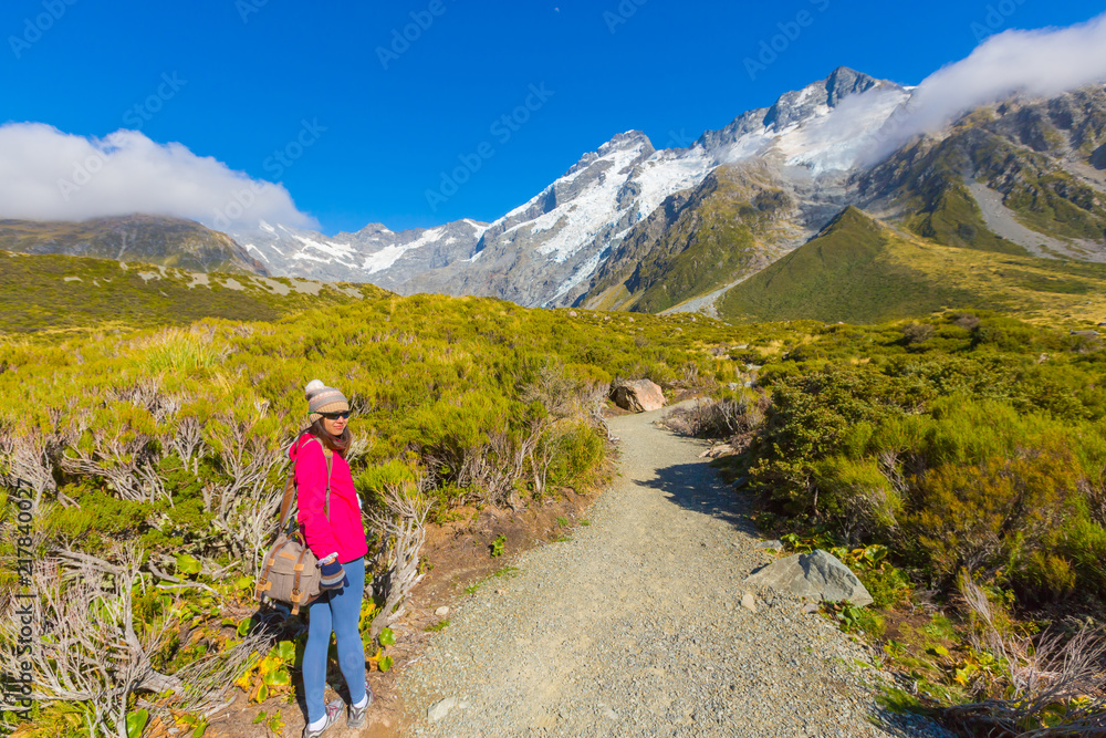 Asian woman travel enjoy at Mt. cook national park in New Zealand, Summertime