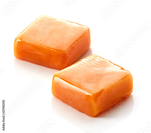 caramel candies on white background