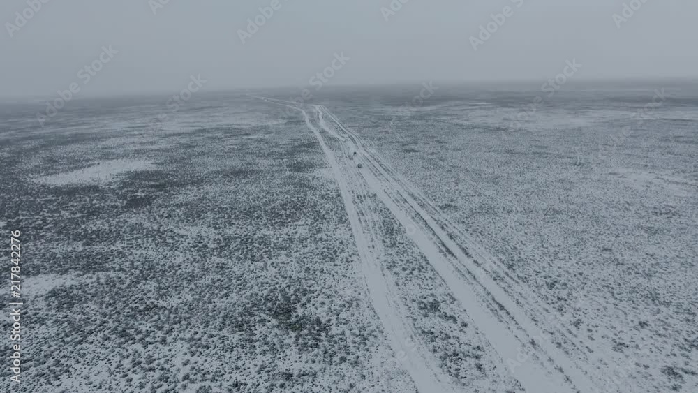 Amazing aerial view of snow-covering sandy mountains in Western Kazakhstan, Mangyshlak Peninsula. Desert in the snow. Amazing aerial view of snow-covering sandy mountains in Western Kazakhstan, Mangyshlak Peninsula. Desert in the snow.