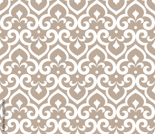 Wallpaper in the style of Baroque. Seamless vector background. White and beige floral ornament. Graphic pattern for fabric, wallpaper, packaging. Ornate Damask flower ornament