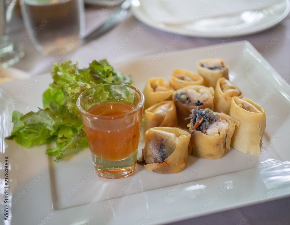 Spring rolls, deep fried with sweet source Spring rolls, deep fried with sweet source